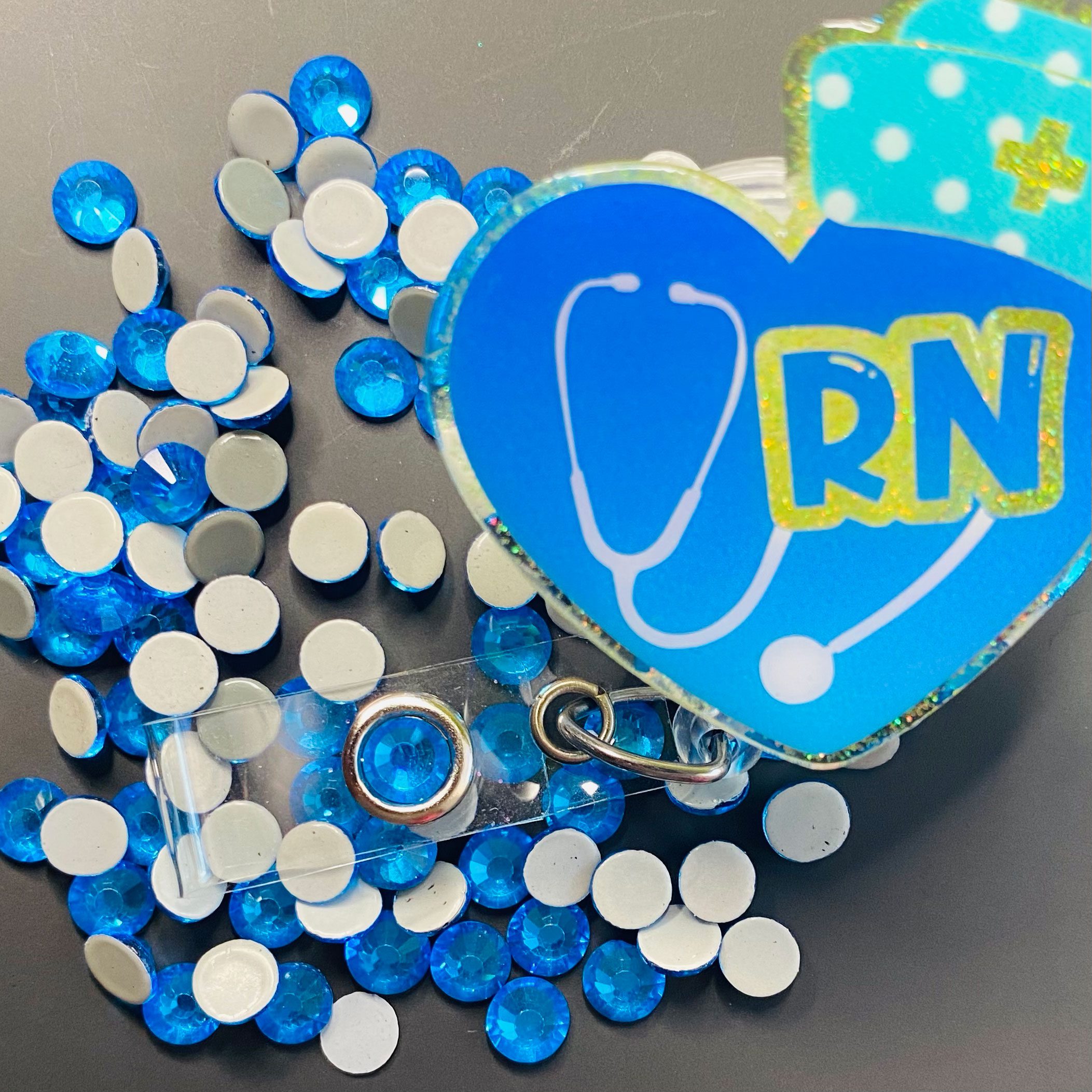 Alternative view of Capri Blue Hotfix Rhinestone ss30 (machine cut) 100+ stones